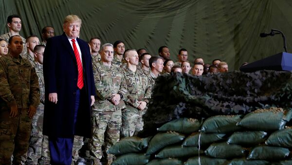 U.S. President Donald Trump delivers remarks to U.S. troops in an unannounced visit to Bagram Air Base, Afghanistan, November 28, 2019. - Sputnik International