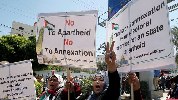 Demonstrators take part in a rally as Palestinians call for a 'day of rage' to protest against Israel's plan to annex parts of the Israeli-occupied West Bank, in Gaza City July 1, 2020. - Sputnik International
