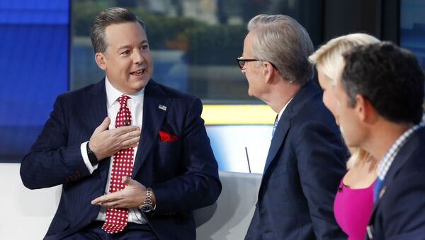 Fox News Chief National Correspondent Ed Henry, left, appears with co-hosts Steve Doocy, second left, Ainsley Earhardt, and Brian Kilmeade on the Fox & friends television program, in New York on Sept. 6, 2019. Fox News has fired news anchor Henry after it received a complaint about workplace sexual misconduct by him - Sputnik International