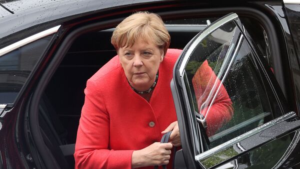 German Chancellor Angela Merkel arrives to attend a session of the lower house of parliament Bundestag, in Berlin, Germany July 1, 2020.  - Sputnik International