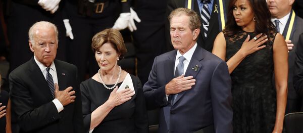 From left, Vice President Joe Biden, Laura Bush, former President George W. Bush, and first lady Michelle Obama stand during an interfaith memorial service for the fallen police officers and members of the Dallas community at the Morton H. Meyerson Symphony Center in Dallas, Tuesday, July 12, 2016, in Dallas. - Sputnik International