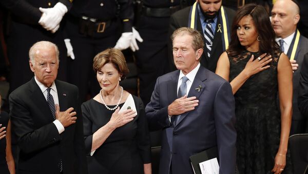 From left, Vice President Joe Biden, Laura Bush, former President George W. Bush, and first lady Michelle Obama stand during an interfaith memorial service for the fallen police officers and members of the Dallas community at the Morton H. Meyerson Symphony Center in Dallas, Tuesday, July 12, 2016, in Dallas. - Sputnik International