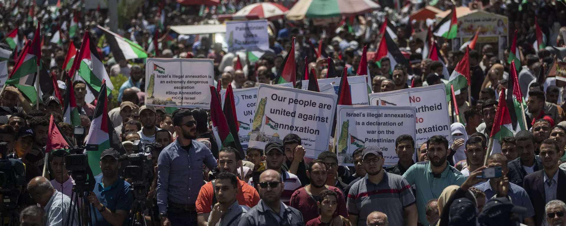 Palestinians demonstrate against Israeli plans for the annexation of parts of the West Bank, in Gaza City, Wednesday, July 1, 2020. - Sputnik International, 1920, 05.08.2020