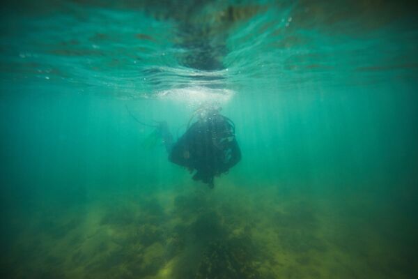 Scientists sent divers to explore possible locations of underwater Aboriginal sites. - Sputnik International