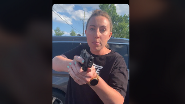 US Woman Pulls Gun on Black Family Following Heated Exchange - Sputnik International