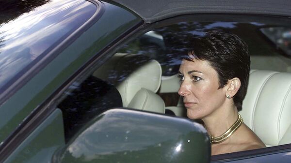FILE - In this Sept. 2, 2000 file photo, British socialite Ghislaine Maxwell, driven by Britain's Prince Andrew leaves the wedding of a former girlfriend of the prince, Aurelia Cecil, at the Parish Church of St Michael in Compton Chamberlayne near Salisbury, England. The FBI said Thursday July 2, 2020, Ghislaine Maxwell, who was accused by many women of helping procure underage sex partners for Jeffrey Epstein, has been arrested in New Hampshire. - Sputnik International