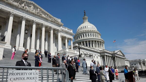 House Democrats with Speaker Nancy Pelosi gather for a press event ahead of vote on the George Floyd Justice in Policing Act of 2020 on the East Front House Steps on Capitol Hill in Washington, U.S., June 25, 2020.  - Sputnik International