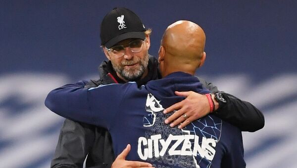 Liverpool manager Juergen Klopp with Manchester City manager Pep Guardiola after the match, as play resumes behind closed doors following the outbreak of the coronavirus disease (COVID-19). - Sputnik International