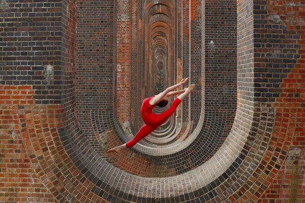 Former Team GB Rhythmic Gymnastic star and dancer Hannah Martin during a training session at Ouse Valley Viaduct, following the outbreak of the coronavirus disease (COVID-19), Sussex, Britain, June 29, 2020 - Sputnik International