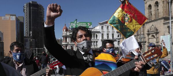 Musicians wearing face masks amid the new coronavirus pandemic march to protest against the government, in La Paz, Bolivia, Monday, June 8, 2020 Musicians wearing face masks amid the new coronavirus pandemic march to protest against the government, in La Paz, Bolivia, Monday, June 8, 2020 - Sputnik International