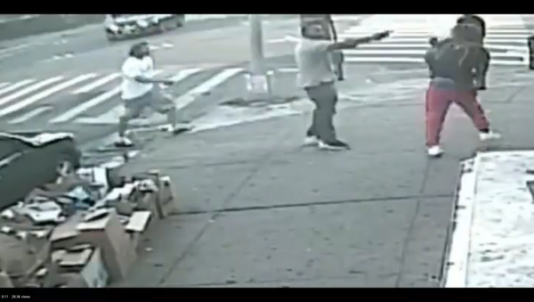 A screenshot from a video of a gunman opening fire on 20-year-old Deondraye Moore in Brooklyn’s Brownsville neighborhood, New York City, US, 02.07.2020. - Sputnik International