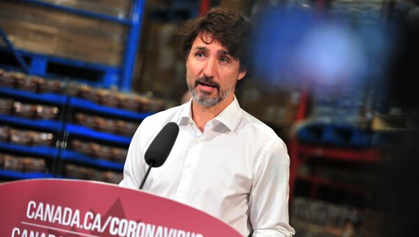 Canadian Prime Minister Justin Trudeau speaks to the press as he volunteers at the Moisson Outaouais food bank in Gatineau, Quebec, Canada, on July 3, 2020, during the coronavirus pandemic.  - Sputnik International