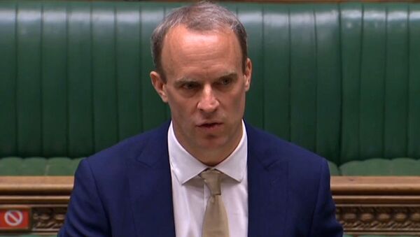 A video grab from footage broadcast by the UK Parliament's Parliamentary Recording Unit (PRU) shows Britain's Foreign Secretary Dominic Raab as he makes a statement on Hong Kong, in the House of Commons in London on July 1, 2020.  - Sputnik International