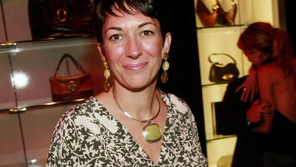 (FILES) In this file photo taken on September 03, 2003, Socialite Ghislaine Maxwell attends the Yves Saint Laurent Rive Gauche 57th Street Boutique Opening Party in New York City. - Maxwell, the former girlfriend of late financier Jeffrey Epstein, was arrested in the United States on July 2, 2020, by FBI officers investigating his sex crimes, multiple US media outlets reported - Sputnik International