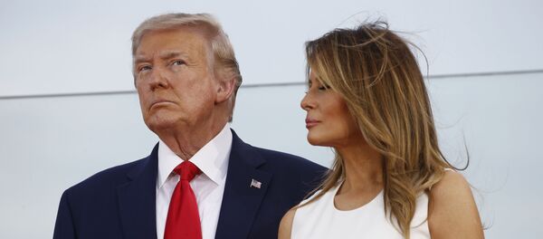 President Donald Trump and first lady Melania Trump stand onstage during a Salute to America event on the South Lawn of the White House, Saturday, 4 July 2020, in Washington - Sputnik International