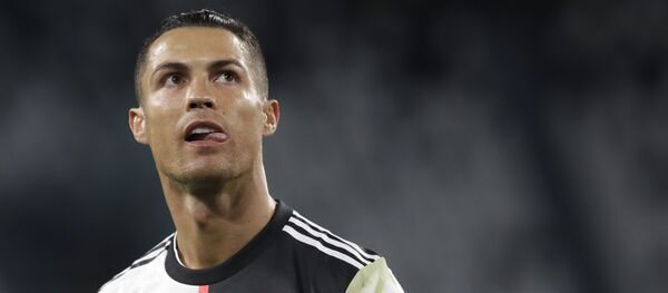 Juventus' Cristiano Ronaldo during an Italian Cup second leg soccer match between Juventus and AC Milan at the Allianz stadium, in Turin, Italy, Friday, 12 June 2020 - Sputnik International