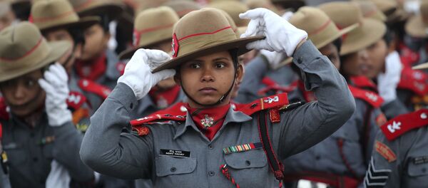 Indian Para-military women soldiers of Assam Rifles adjust their hats during the rehearsals for the upcoming Republic Day parade on Rajpath, the ceremonial boulevard, in New Delhi, India, Monday, Jan. 14, 2019 Indian Para-military women soldiers of Assam Rifles adjust their hats during the rehearsals for the upcoming Republic Day parade on Rajpath, the ceremonial boulevard, in New Delhi, India, Monday, Jan. 14, 2019 - Sputnik International