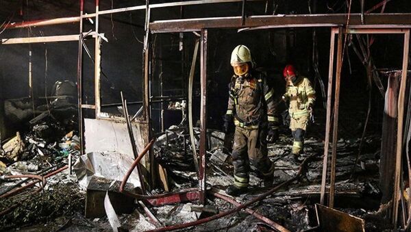 Firefighters inspect the site of an explosion at a medical clinic in the north of the Iranian capital Tehran, Iran, June 30, 2020 - Sputnik International