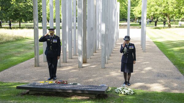 Commissioner of City of London Police Ian Dyson, left, and Metropolitan Police Commissioner Cressida Dick lay a wreath at the 7 July Memorial in Hyde Park, London, Tuesday July 7, 2020, on the 15th anniversary of the attack on the capital - Sputnik International