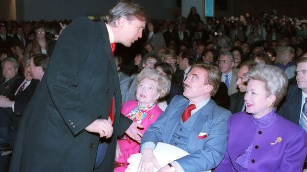 Donald Trump, left, talks with his parents, Mary and Fred and his sister, U.S. District Court Judge Maryanne Trump Barry, at the opening of Trump's Taj Mahal Casino Resort in Atlantic City, N.J., Thurs., April 5, 1990 - Sputnik International