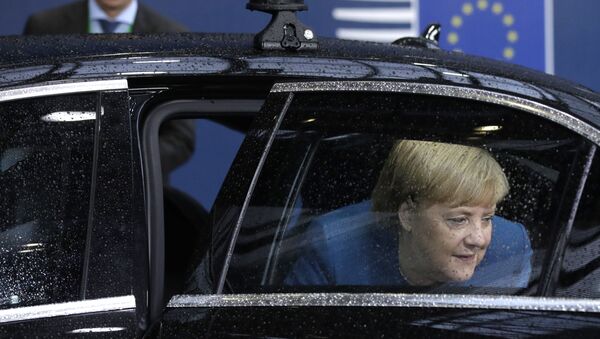 German Chancellor Angela Merkel steps out of her car as she arrives for a European Union Summit at European Union Headquarters in Brussels on October 18, 2019 - Sputnik International