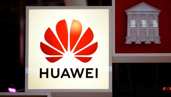 FILE PHOTO: The Huawei logo is seen at the high profile startups and high tech leaders gathering, Viva Tech,in Paris, France May 16, 2019 - Sputnik International