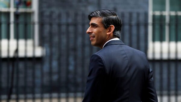 Chancellor of the Exchequer Rishi Sunak is seen as he arrives at Downing Street - Sputnik International