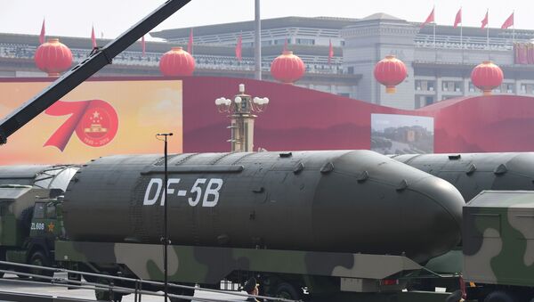 Military vehicles carrying DF-5B intercontinental ballistic missiles participate in a military parade at Tiananmen Square in Beijing on October 1, 2019, to mark the 70th anniversary of the founding of the People's Republic of China.  - Sputnik International