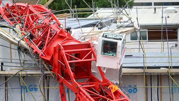 A collapsed crane at a construction site in Bow, east London - Sputnik International