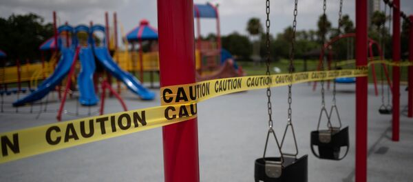 An empty playground is surrounded by caution tape amid the global outbreak of the coronavirus disease (COVID-19) in Seabrook, Texas, US, July 8, 2020 - Sputnik International