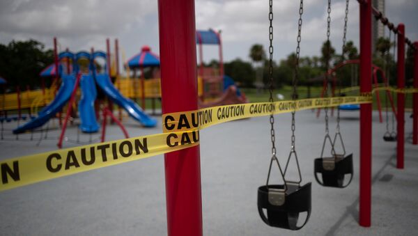 An empty playground is surrounded by caution tape amid the global outbreak of the coronavirus disease (COVID-19) in Seabrook, Texas, US, July 8, 2020 - Sputnik International