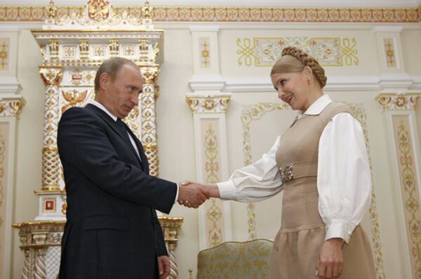 Встреча глав правительств России и Украины Владимира Путина и Юлии Тимошенко - Sputnik International