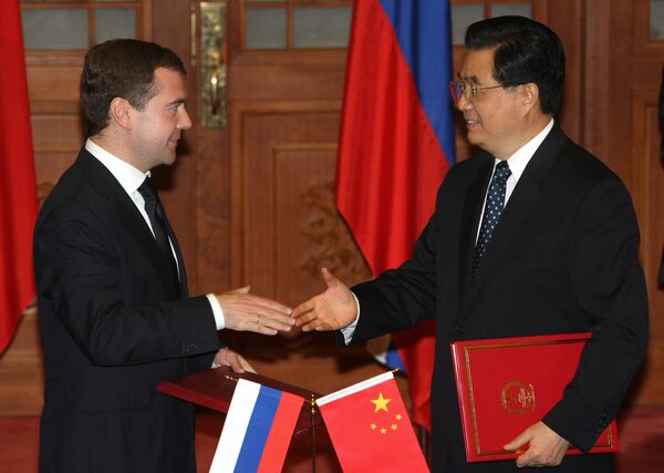 Russian-Chinese relations hinge on delicate balance of interests - Sputnik International