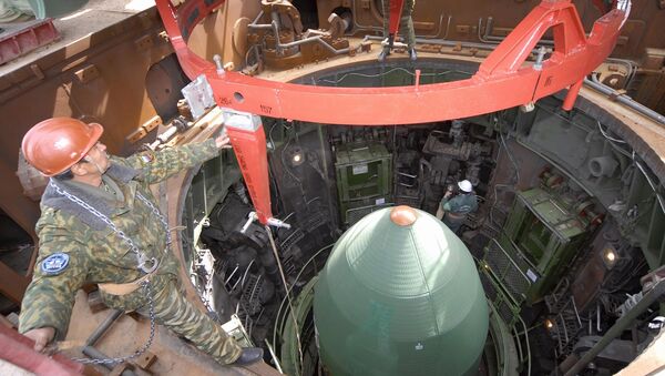 The Dnepr-1, a civilian modification of the RS-20 ICBM, Nato codename 'Satan'. File photo of a silo being prepared at Baikonur Cosmodrome for the launch of the RS-20 Dnepr. - Sputnik International