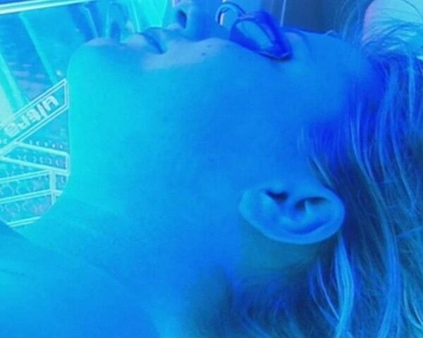 A sun tan worth dying for? - Sputnik International