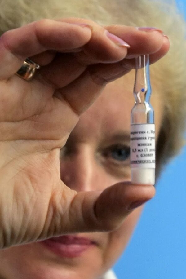 Mass swine flu vaccination to start in U.S. in October  - Sputnik International