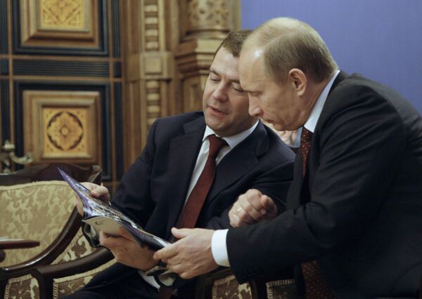 President Dmitry Medvedev and Prime Minister Vladimir Putin  - Sputnik International