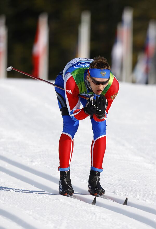 Russia's Nikita Kriukov has won the Olympic gold medal in the men's cross-country individual sprint race at the Vancouver Winter Games - Sputnik International