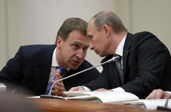 Igor Shuvalov and Vladimir Putin - Sputnik International