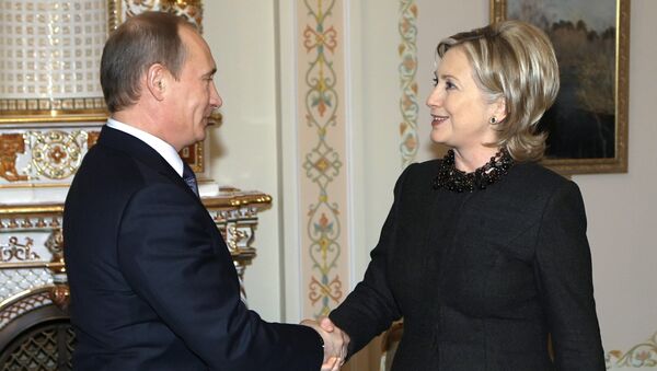 Russian Prime Minister Vladimir Putin meets with US Secretary of State Hillary Clinton in Novo-Ogarevo - Sputnik International