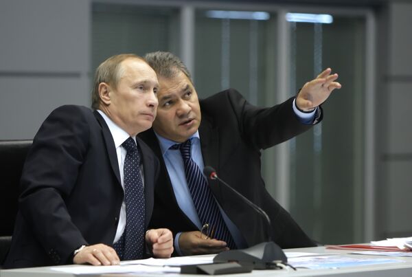 Russian Prime Minister Vladimir Putin and Emergency Minister Sergei Shoigu - Sputnik International