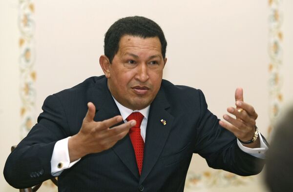 Putin to shake hands on contracts with Chavez - Sputnik International
