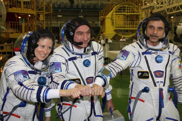 NASA astronaut Scott Kelly and russian cosmonaut Mikhail Korniyenko (archive) - Sputnik International