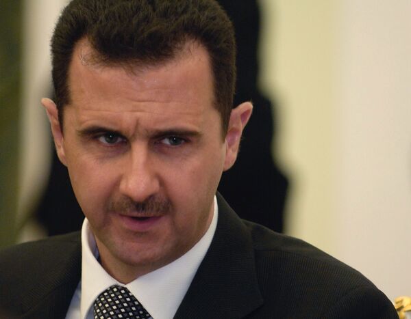 Syrian President Bashar al-Assad and his Iranian counterpart Mahmoud Ahmadinejad - Sputnik International
