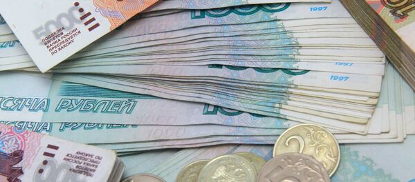 The International Monetary Fund (IMF) is expecting the Russian economy to contract by three percent in 2015, according to its latest report on global economic trends. The International Monetary Fund (IMF) is expecting the Russian economy to contract by three percent in 2015, according to its latest report on global economic trends. - Sputnik International