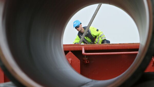 A worker preparing the pipes for the construction of the Nord Stream pipeline (File) - Sputnik International