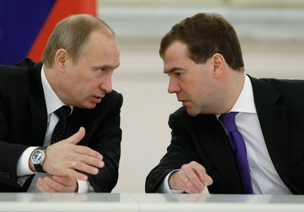 Vladimir Putin and  Dmitry Medvedev  - Sputnik International