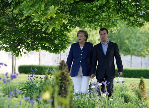German Chancellor Angela Merkel and Russian President Dmitry Medvedev - Sputnik International