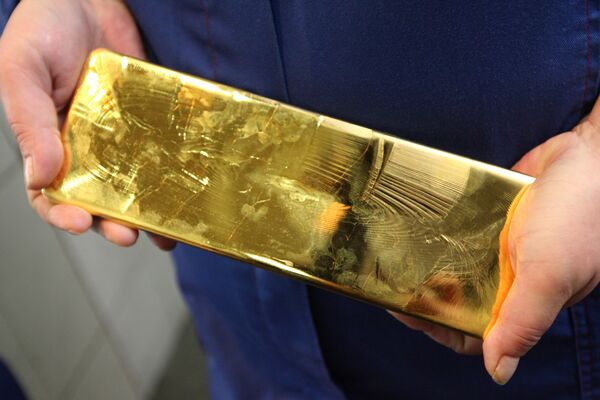 Man Dumps 1Kg. Gold Brick in Charity Box - Sputnik International