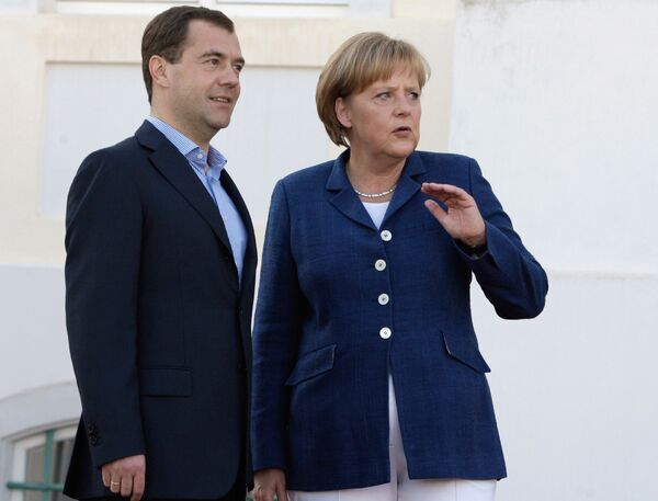 German Chancellor Angela Merkel and Russian President Dmitry Medvedev. Archive - Sputnik International